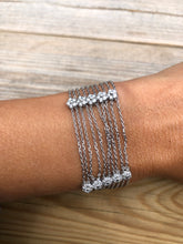 Charger l'image dans la galerie, Bracelet or gris et diamant sur chaine força limée alternée de 4 motifs avec des fleurs