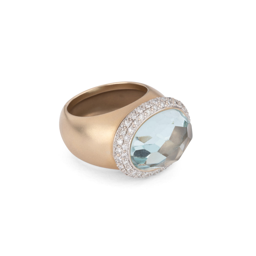 Bague or rose sablé signée de la maison italienne Pomellato ornée d'une aigue marine