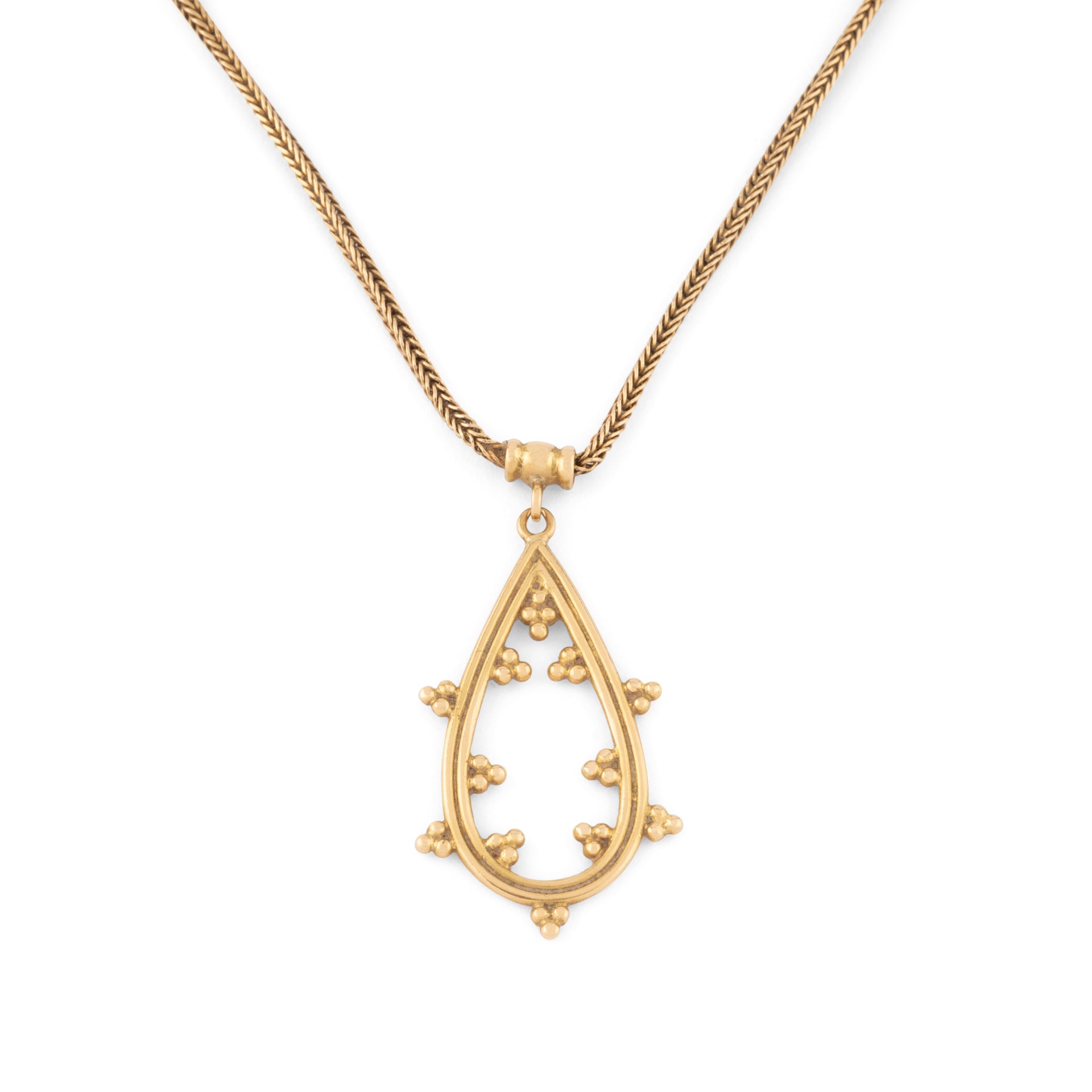 Chaîne en or jaune et pendentif assorti ciselé du créateur grec Zolotas