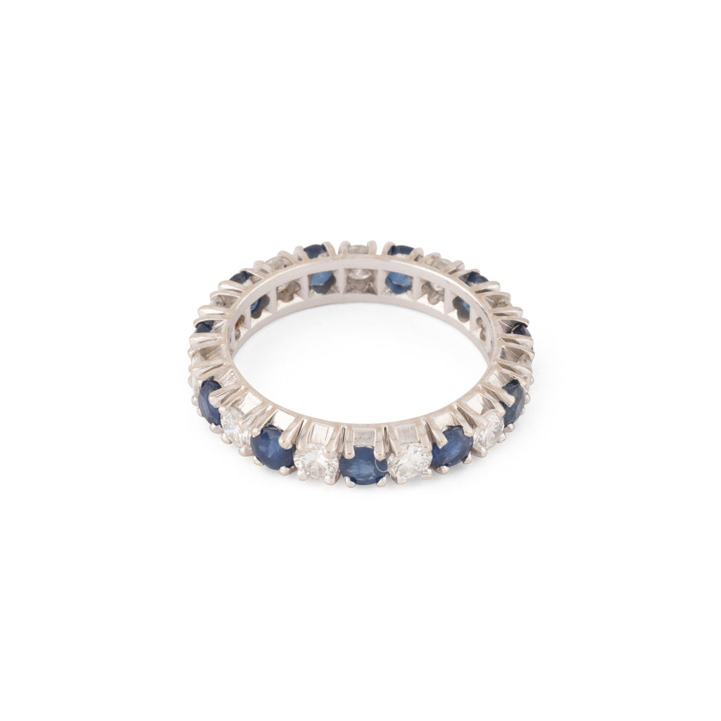 Alliance américaine en or gris,diamant et saphir .