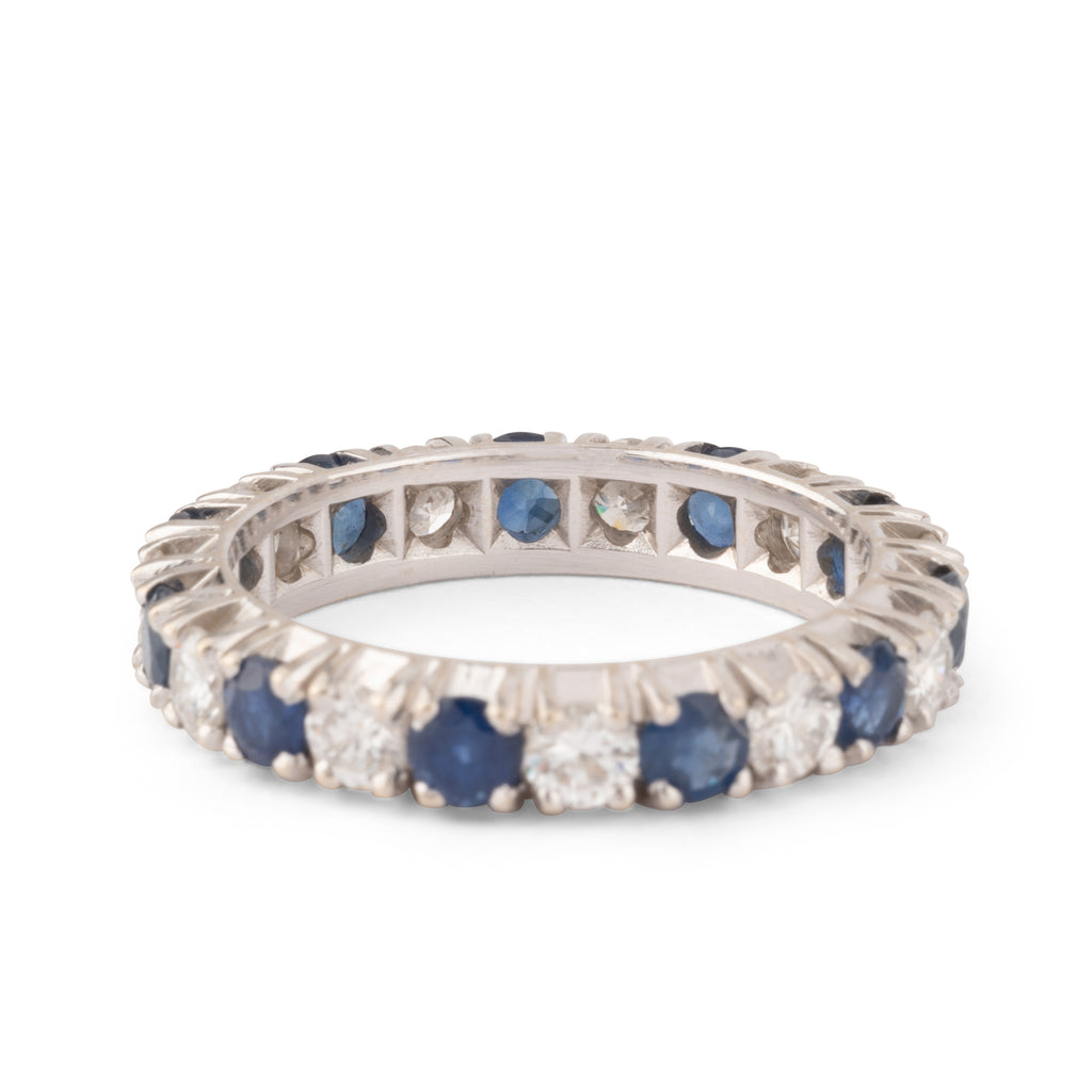 Alliance américaine en or gris,diamant et saphir .