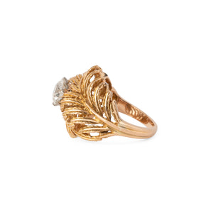 Bague en or jaune en forme de plume ornée d'un solitaire