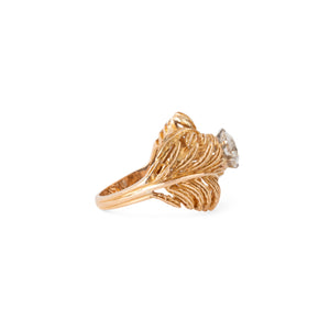 Bague en or jaune en forme de plume ornée d'un solitaire