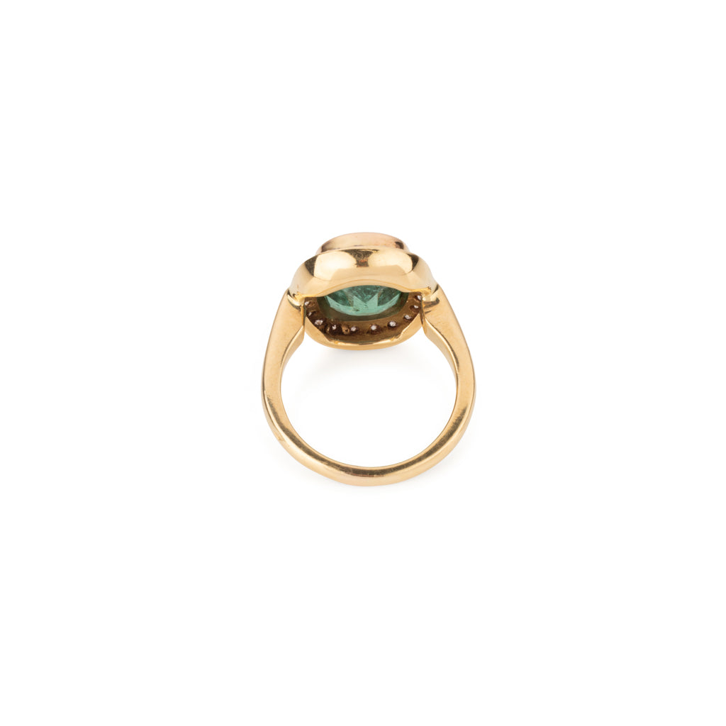 Bague en or jaune ornée d'une émeraude