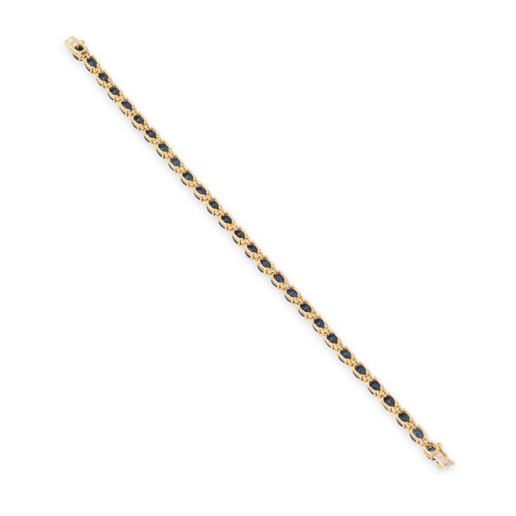 Bracelet or jaune, diamants et saphirs