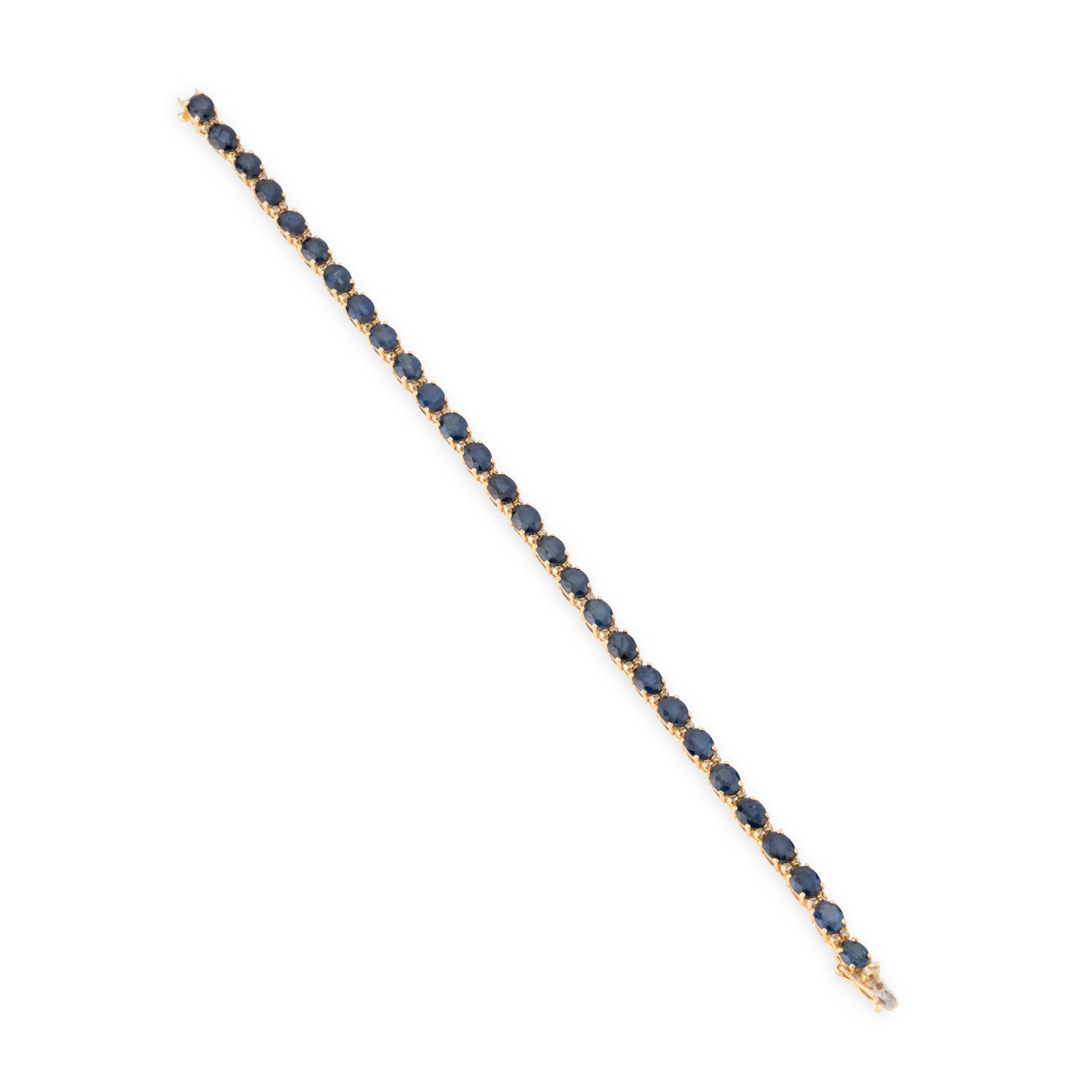 Bracelet or jaune, diamants et saphirs
