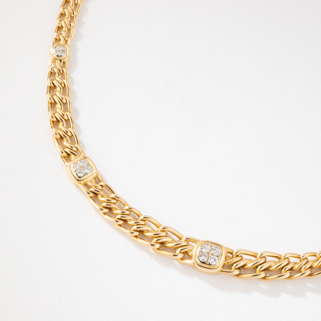 Collier or jaune maille gourmette intercalé de maillon en  diamant