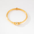 Bracelet jonc en or jaune 22k du créateur Lalaounis