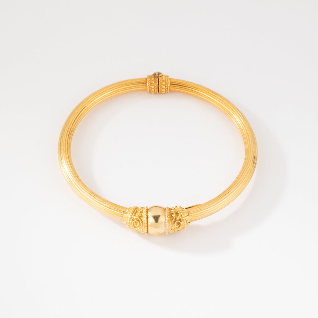 Bracelet jonc en or jaune 22k du créateur Lalaounis