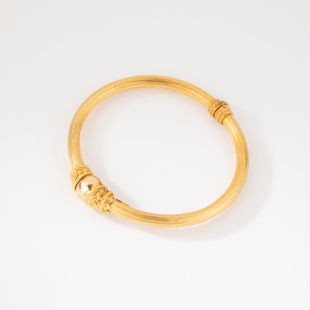 Bracelet jonc en or jaune 22k du créateur Lalaounis