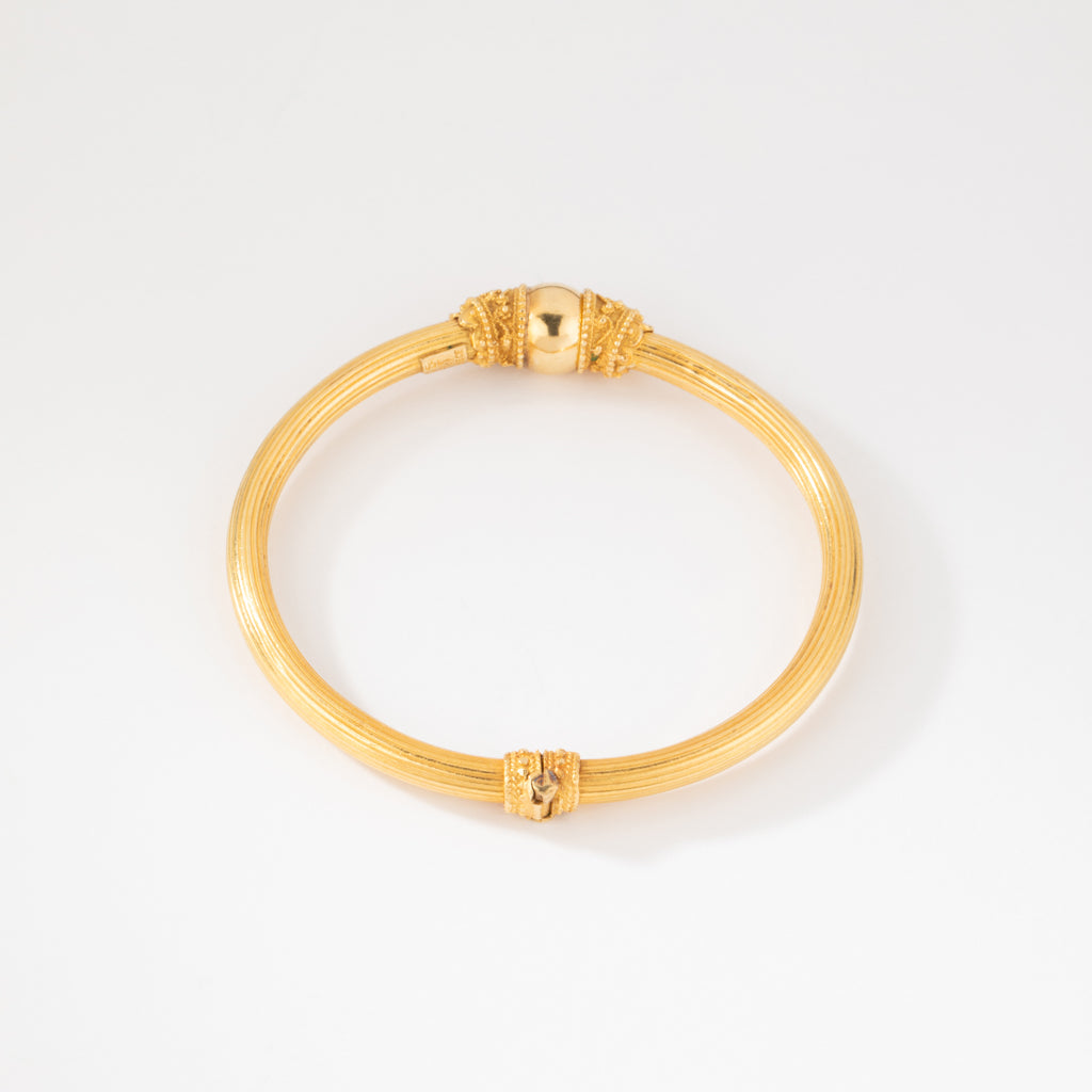 Bracelet jonc en or jaune 22k du créateur Lalaounis