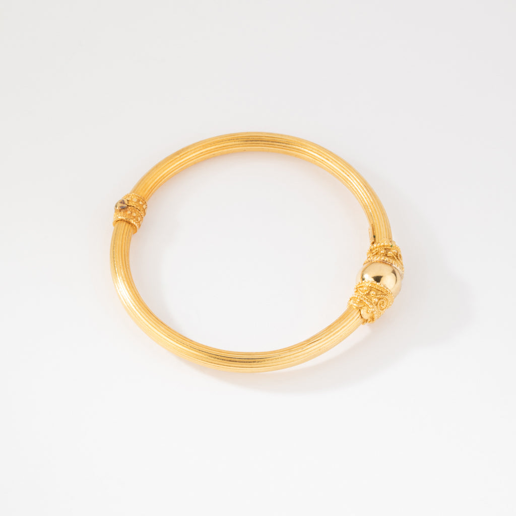 Bracelet jonc en or jaune 22k du créateur Lalaounis