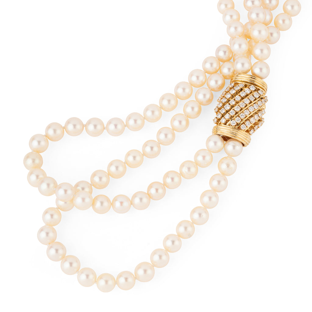 Double strand Akoya cultured pearl necklace with a gold and diamond clasp
