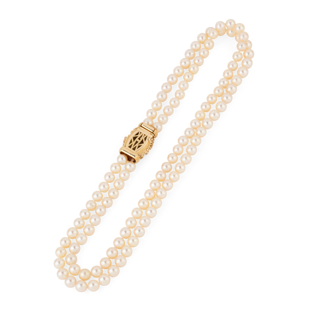 Double strand Akoya cultured pearl necklace with a gold and diamond clasp