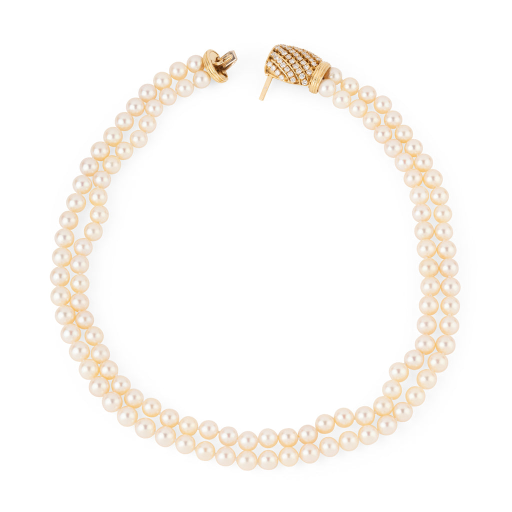 Double strand Akoya cultured pearl necklace with a gold and diamond clasp