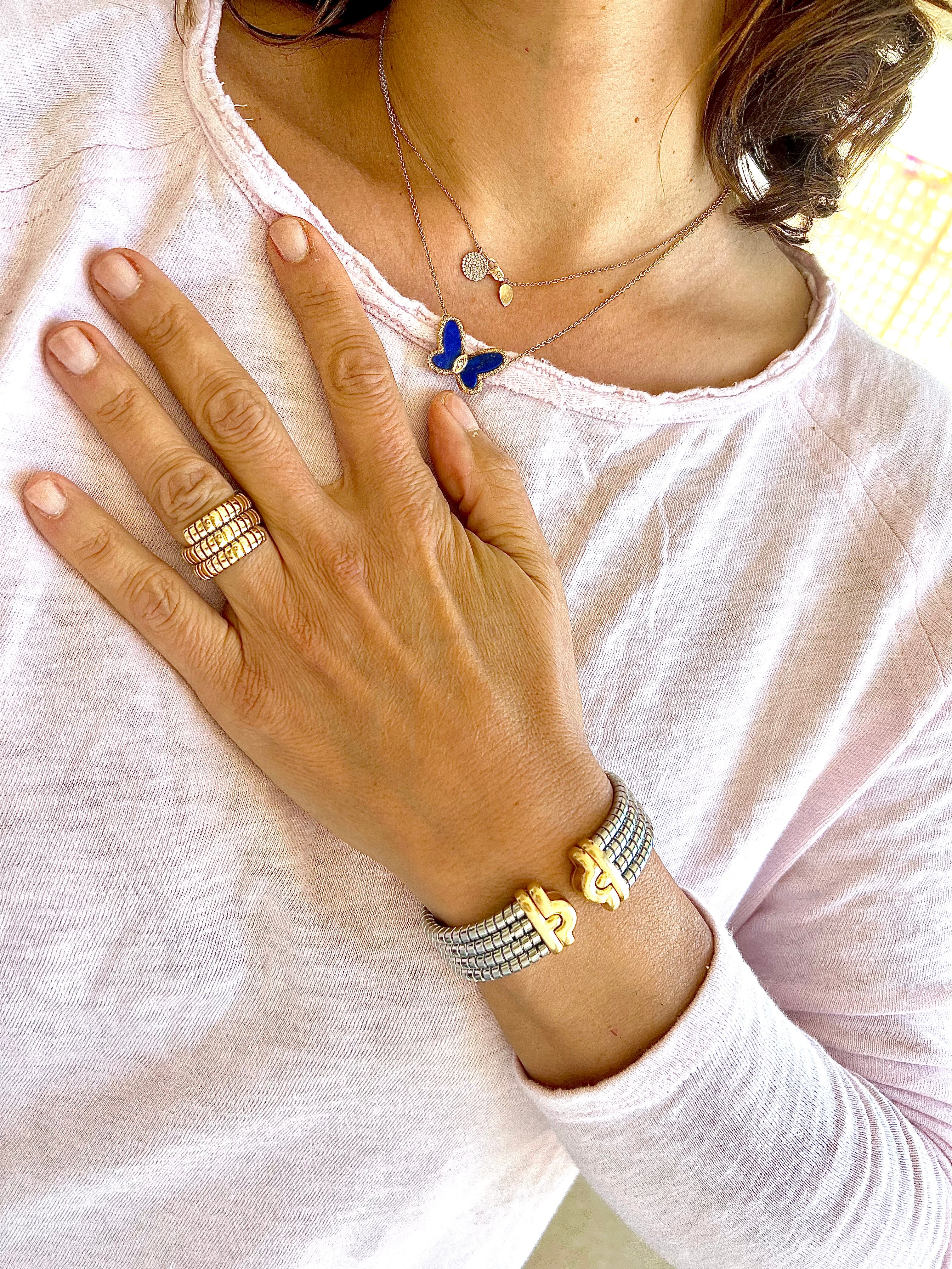 Bracelet de la Maison Bvlgari,collection Parentesi en acier et or jaune