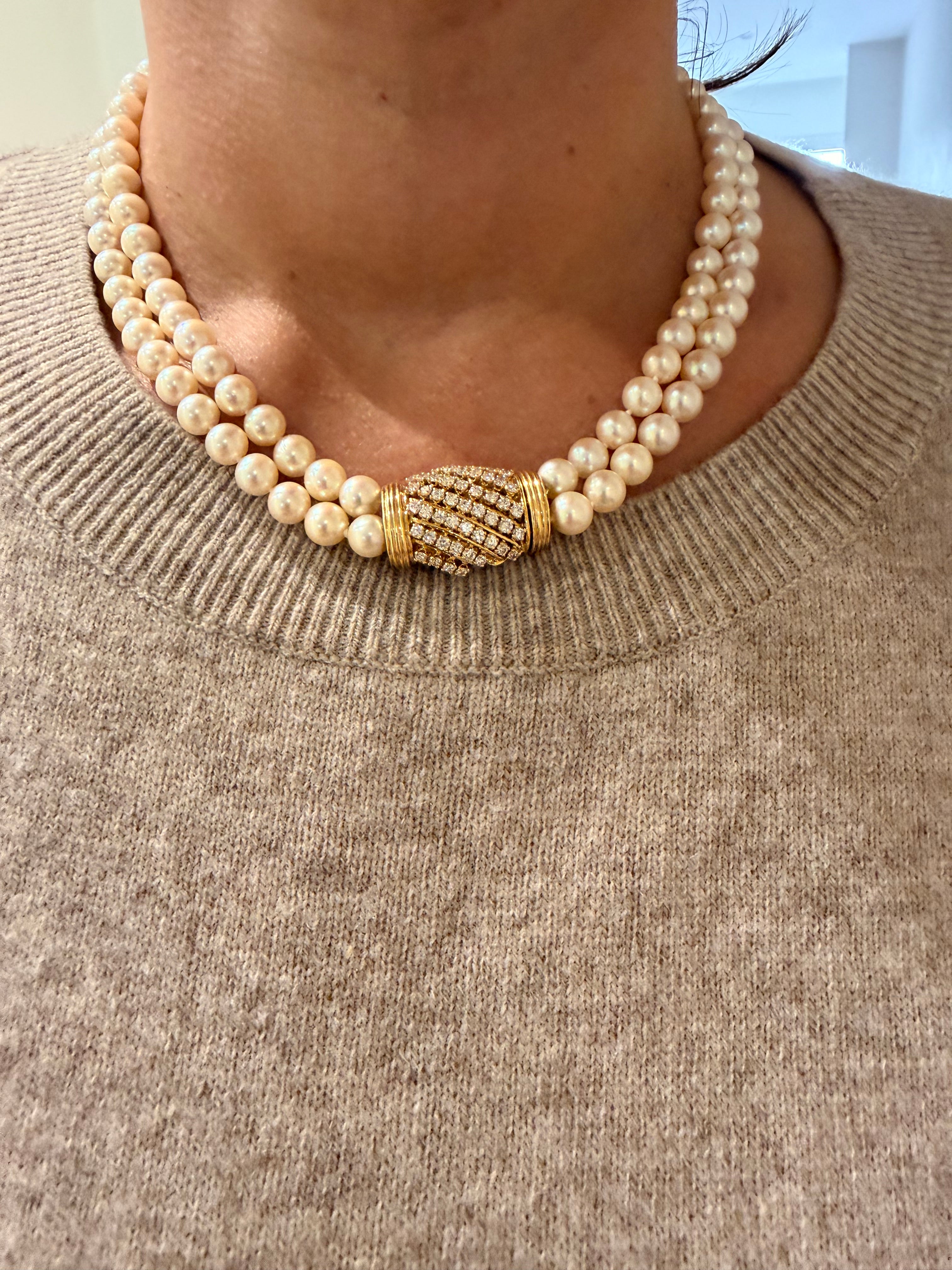 Double strand Akoya cultured pearl necklace with a gold and diamond clasp