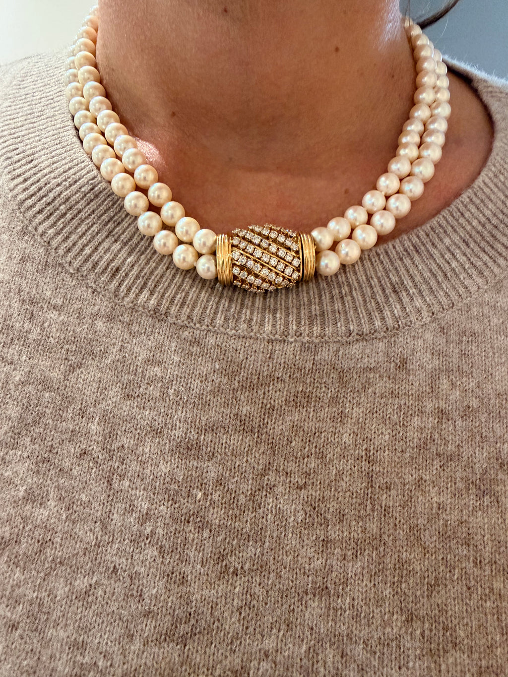 Double strand Akoya cultured pearl necklace with a gold and diamond clasp
