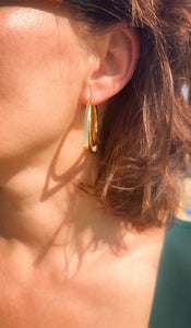 Boucles d'oreille en or jaune de la maison Fred, modèle Success