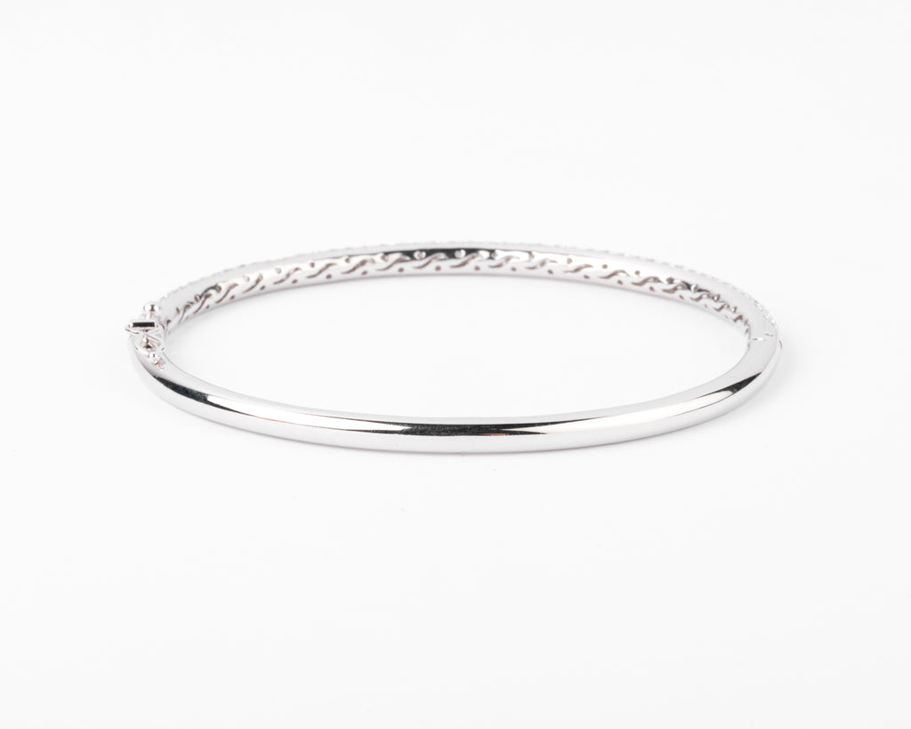 Bracelet jonc en or gris serti de 3 lignes de diamant