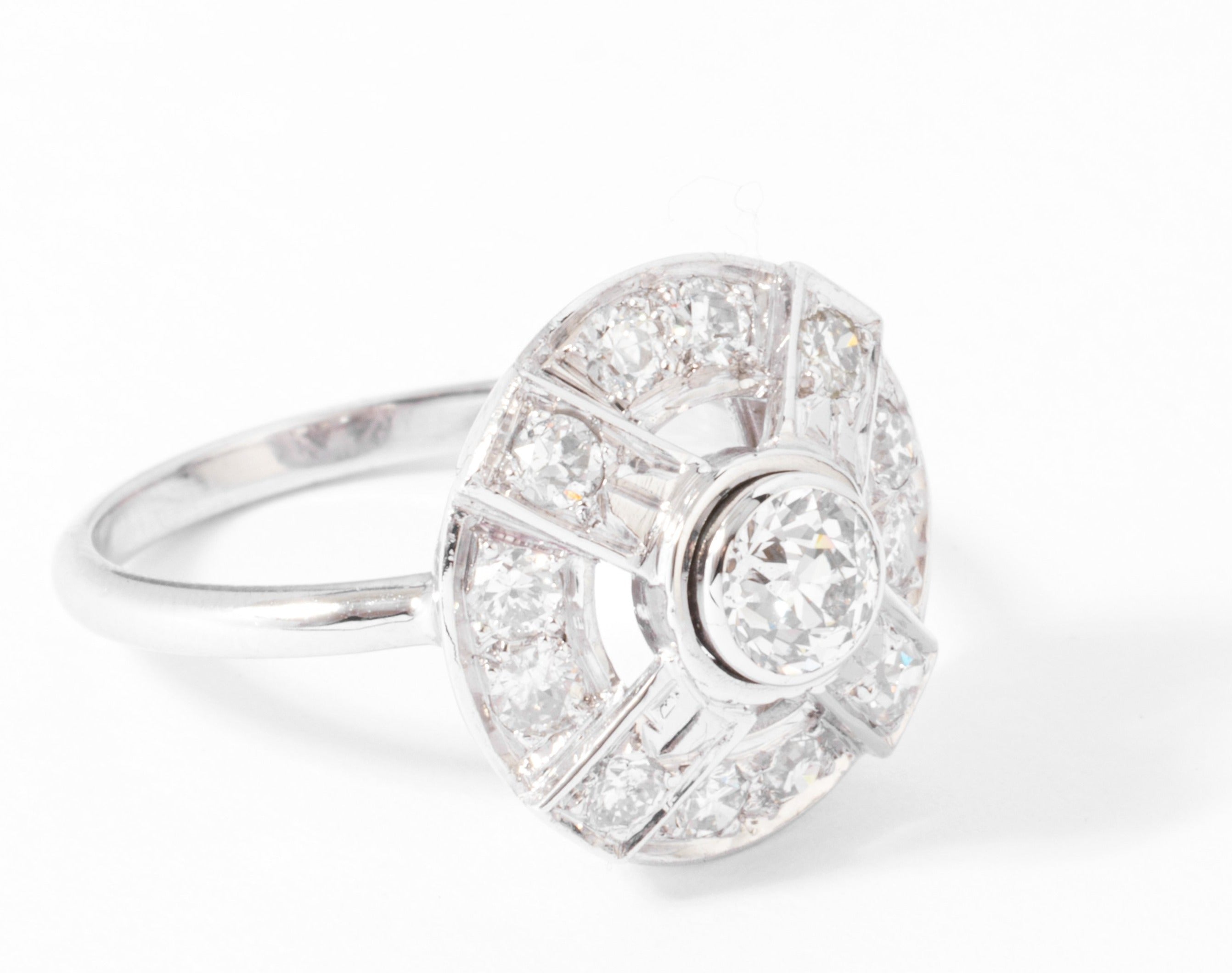 Bague marguerite en platine or gris et diamants