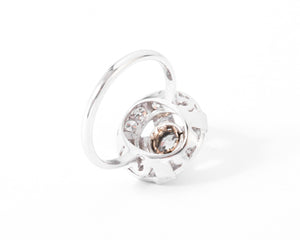 Bague marguerite en platine or gris et diamants