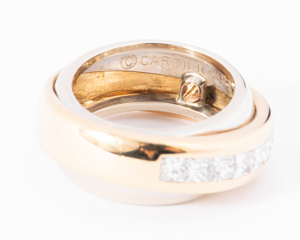 Bague jonc signée Cartier bi-colore en diamants princesses