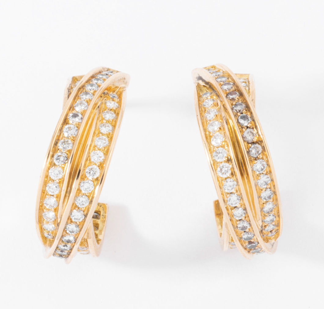 Boucles d'oreilles or jaune et diamant de la maison Cartier modèle Trinity