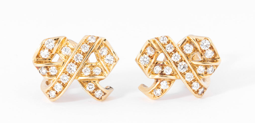 Boucles d'oreilles signée de la maison Dior en or jaune et diamant