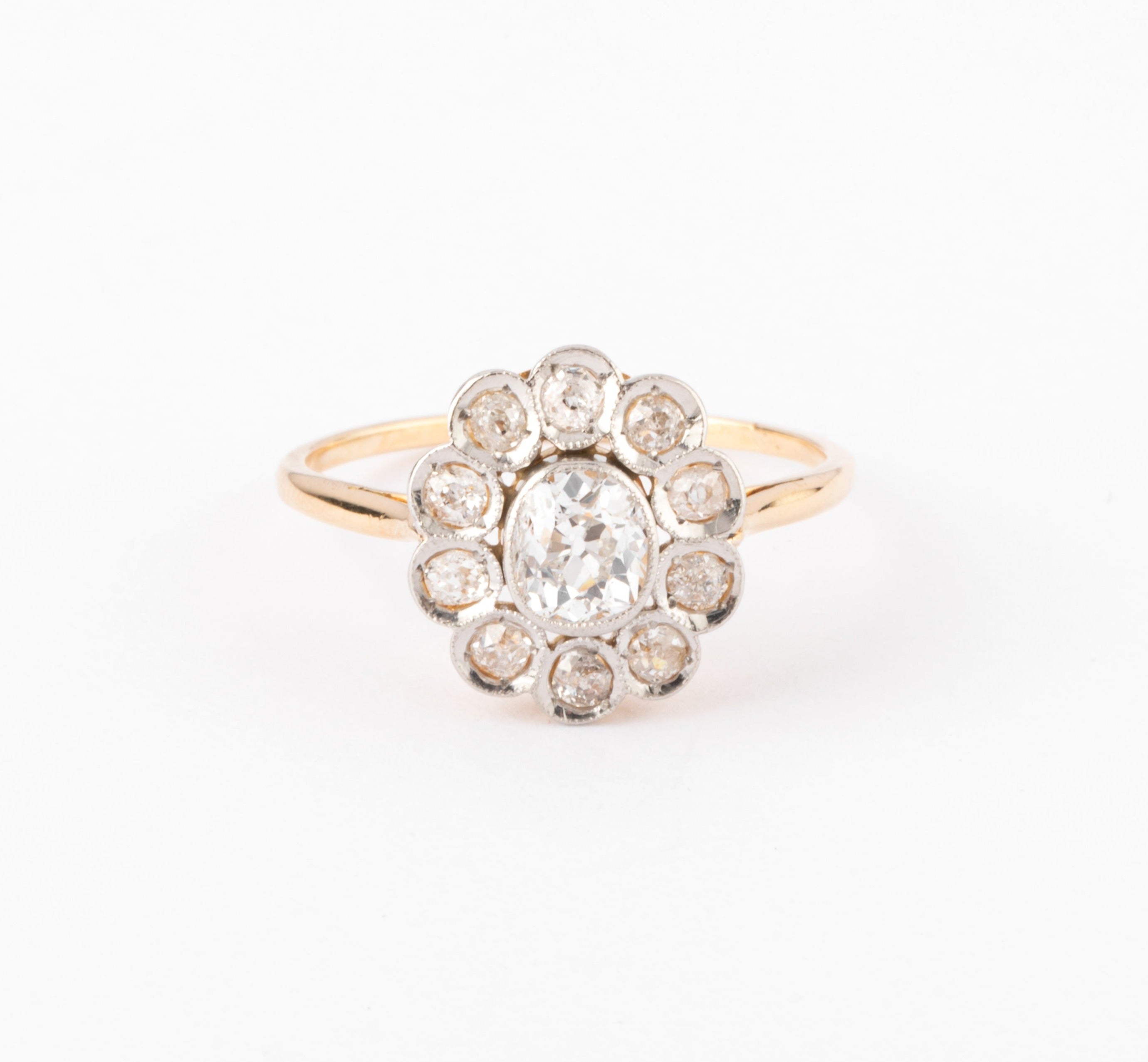 Bague marguerite ancienne en or et diamant