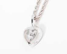 Charger l&#39;image dans la galerie, Un pendentif or gris signé de la maison Chopard
