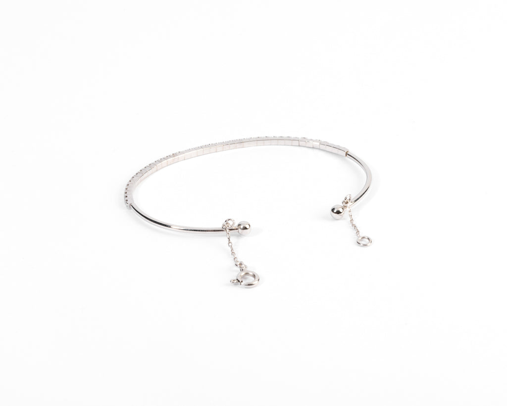 Bracelet demi jonc or gris et diamant sur le dessus