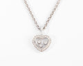 Un pendentif or gris signé de la maison Chopard