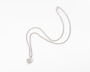 Un pendentif or gris signé de la maison Chopard