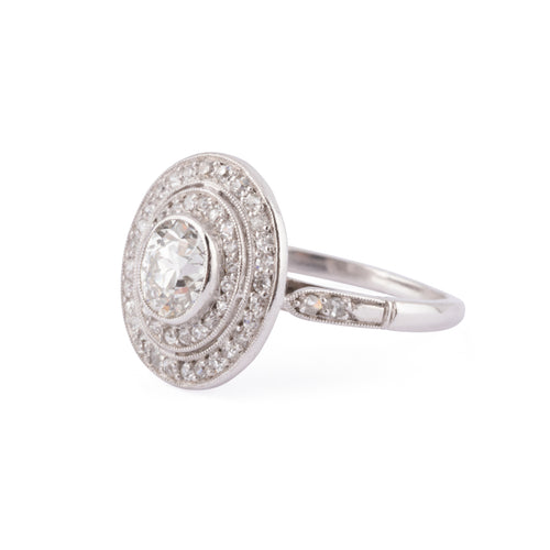 Bague double entourage en platine et diamants