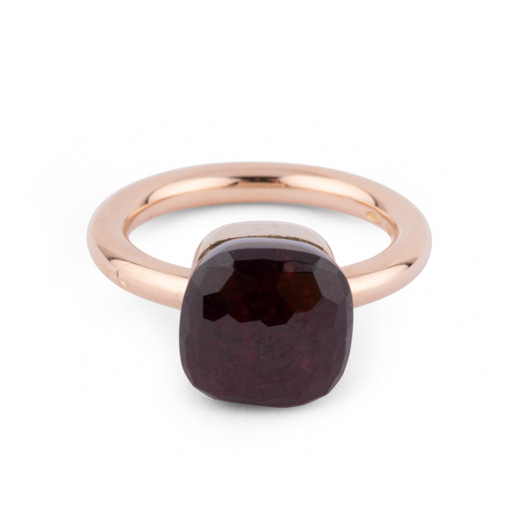 Bague Pomellato modèle Nudo en grenat