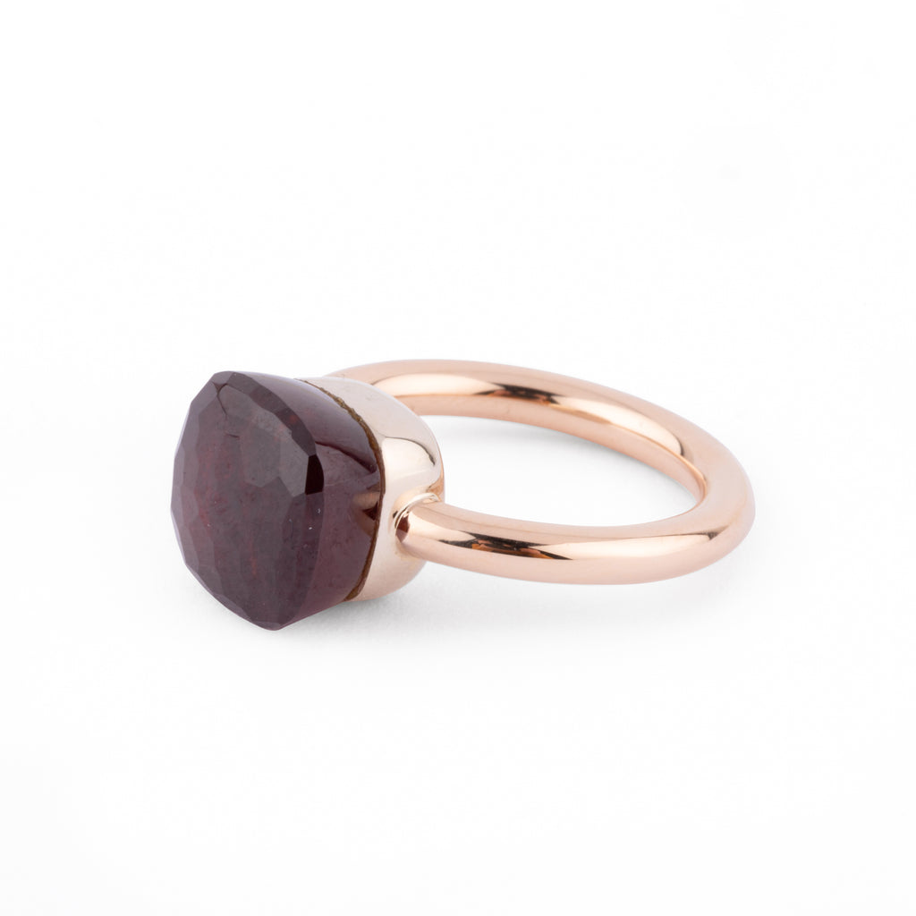Bague Pomellato modèle Nudo en grenat