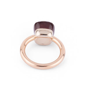 Bague Pomellato modèle Nudo en grenat