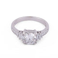 Bague or gris ornée d'un diamant taille brillant