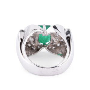 Bague en or gris et platine ornée d'une émeraude et diamants