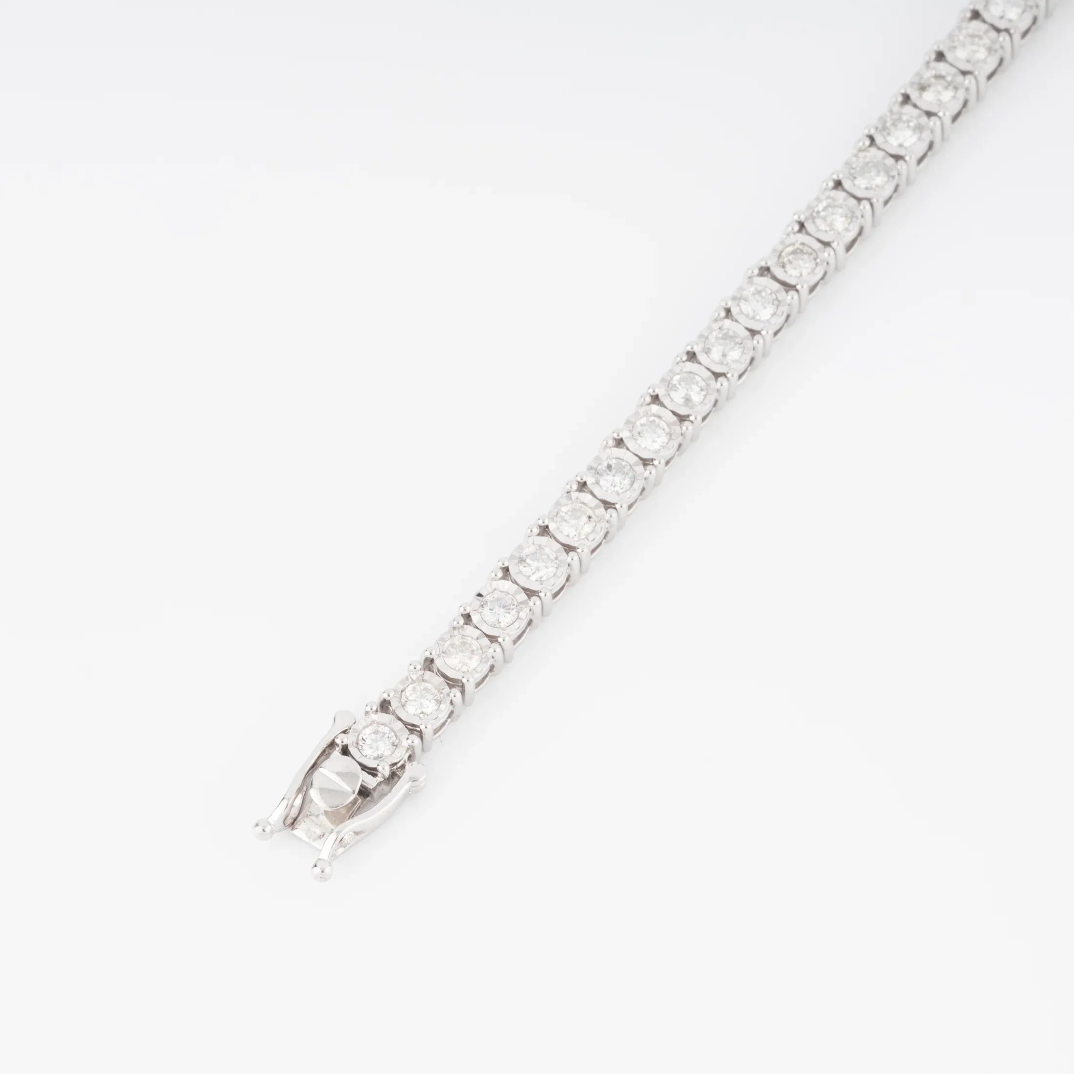 Bracelet riviere et or gris orné de diamant