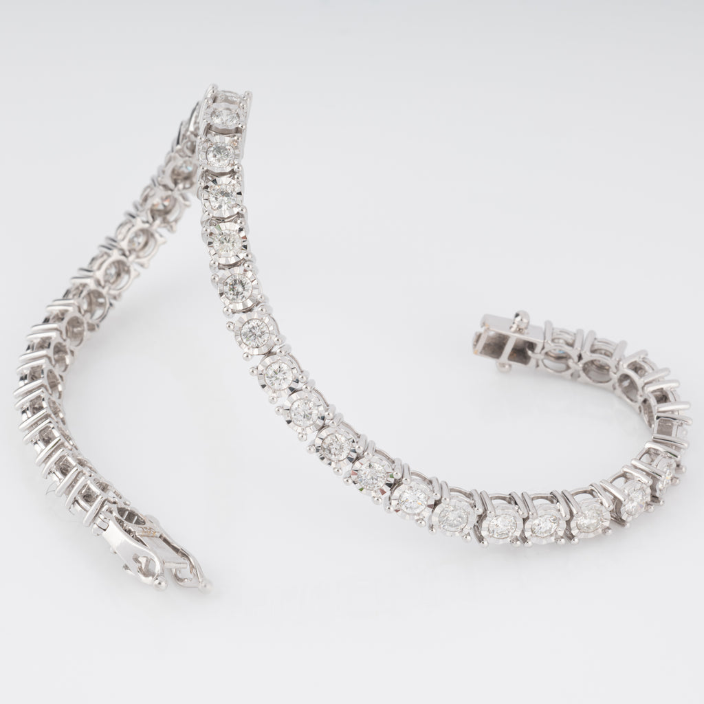 Bracelet riviere et or gris orné de diamant