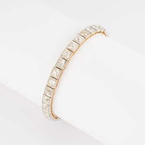 Bracelet riviere or et platine orné de diamant taille brillant