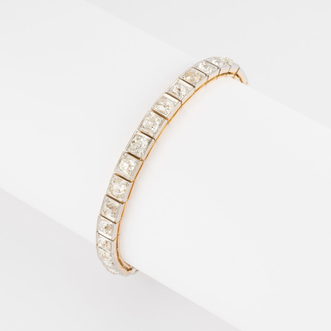 Bracelet riviere or et platine orné de diamant taille brillant