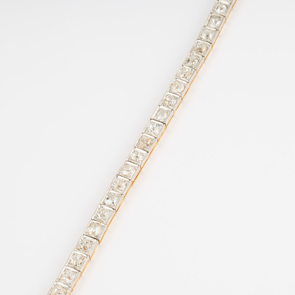 Bracelet riviere or et platine orné de diamant taille brillant