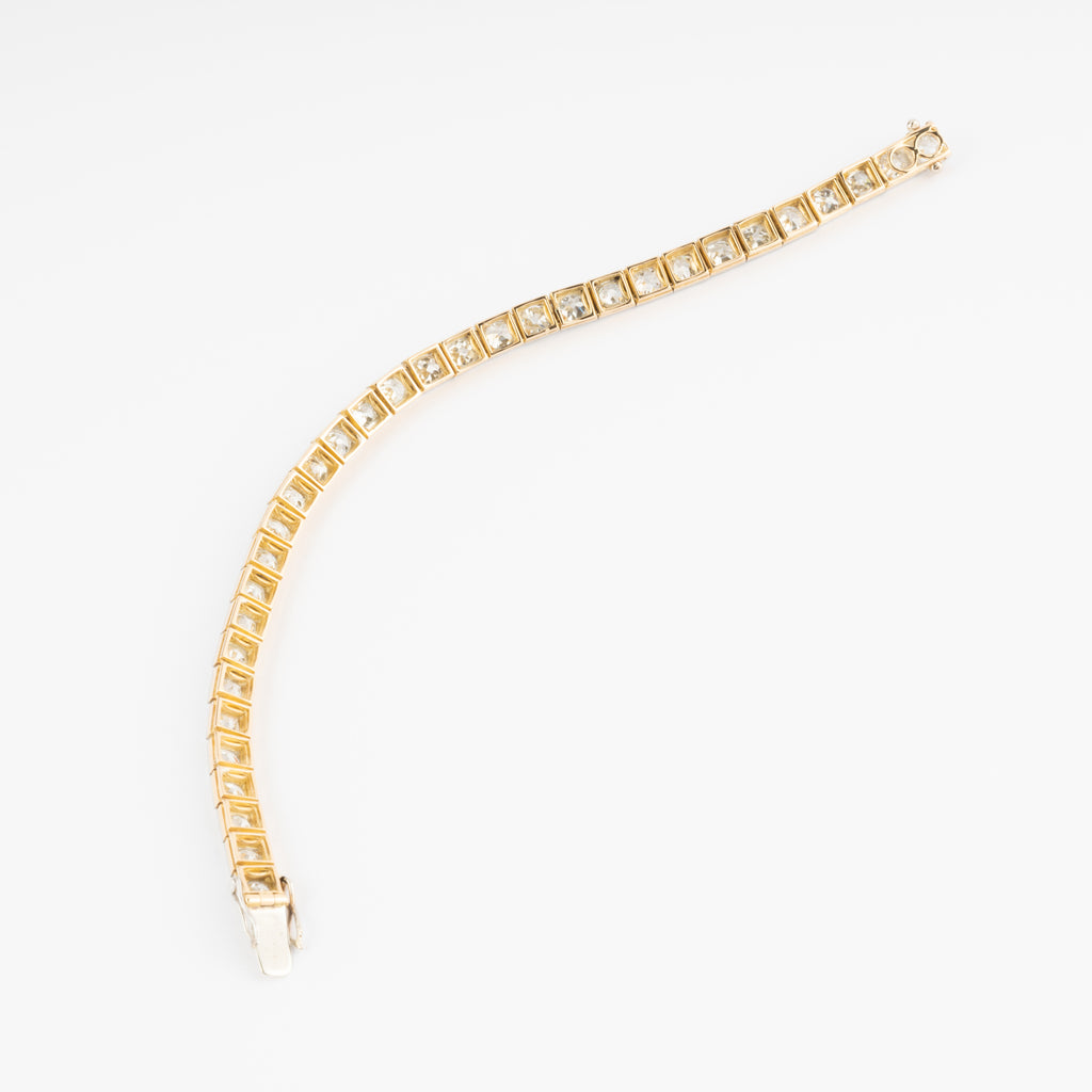 Bracelet riviere or et platine orné de diamant taille brillant