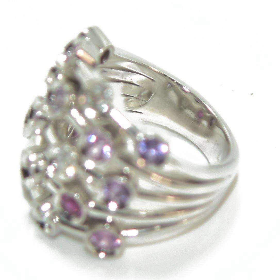 Bague or gris signée de la maison Chanel - adalgyseboutique