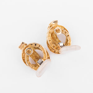 Boucles d'oreilles or jaune signée Hermès