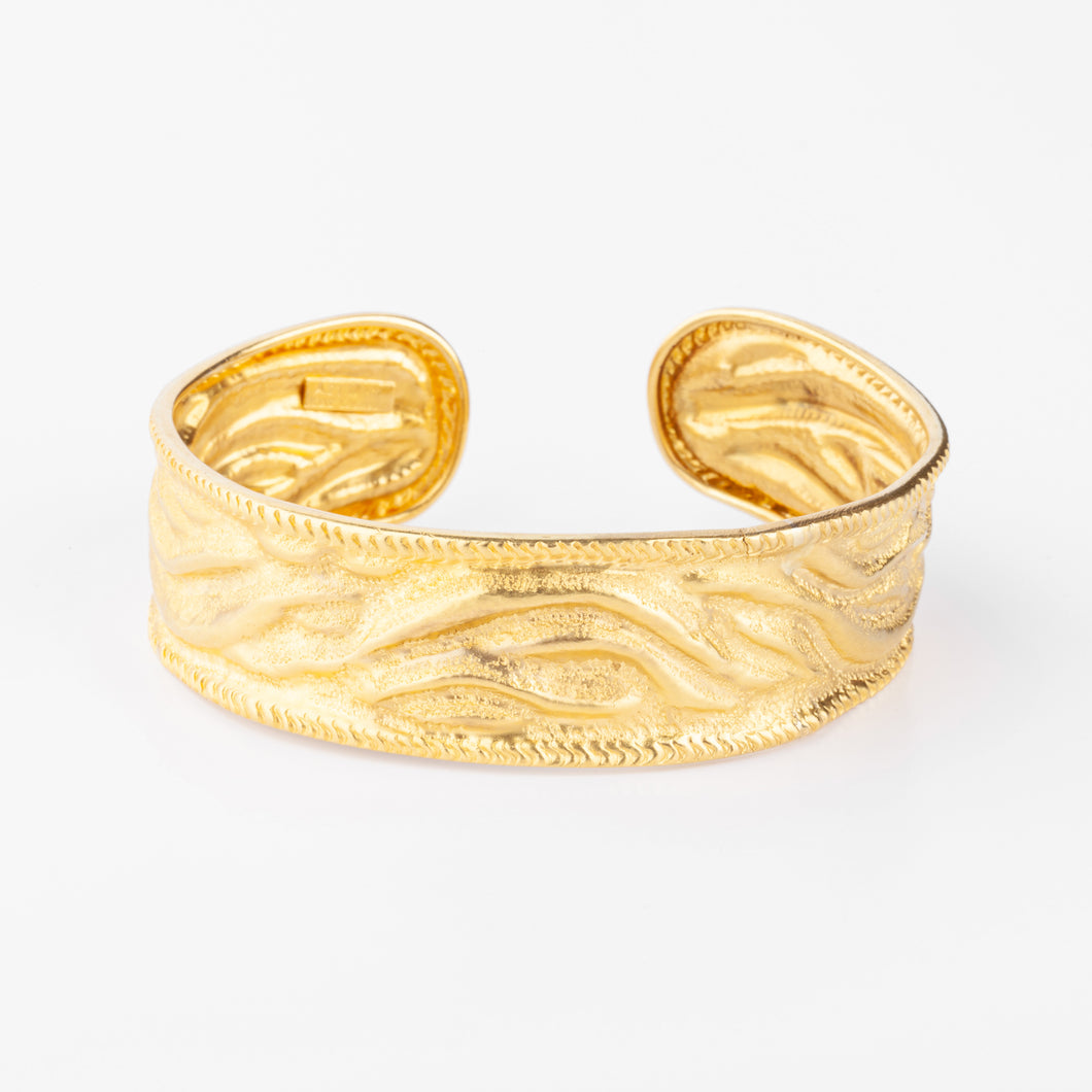 Bracelet jonc or jaune du créateur Ilias Lalaounis texturé