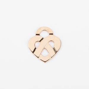 Pendentif en or jaune formant un cœur de la maison Poiray